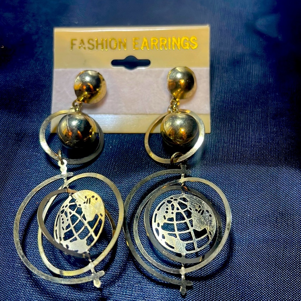 Fashion dangling earrings.